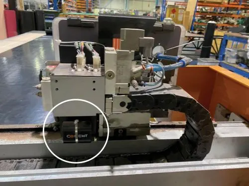 IoT sensor highlighted on a production machine